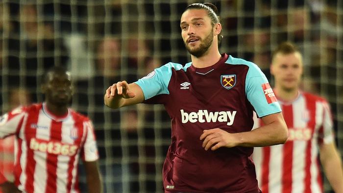 West Ham United's English striker Andy Carroll celebrates scoring his team's first goal during the English Premier League football match between West Ham United and Stoke City at The London Stadium, in east London on April 16, 2018. / AFP PHOTO / Glyn KIRK / RESTRICTED TO EDITORIAL USE. No use with unauthorized audio, video, data, fixture lists, club/league logos or 'live' services. Online in-match use limited to 75 images, no video emulation. No use in betting, games or single club/league/player publications.  /