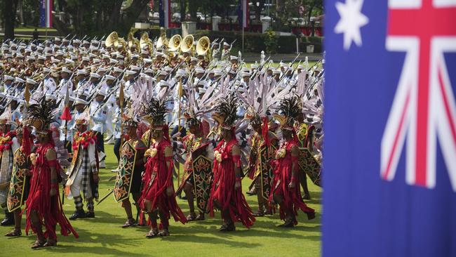A honour guard in traditional dress. Picture: AP