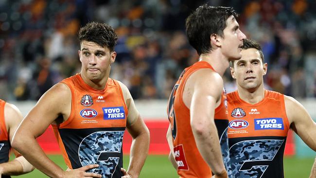 Giants Finn Callaghan and team-mates after the loss during the AFL Round 7 match between the GWS Giants and Western Bulldogs at Manuka Oval, Canberra on April 26, 2025. Photo by Phil Hillyard (Image Supplied for Editorial Use only - NO ON SALES - copyright Phil Hillyard )