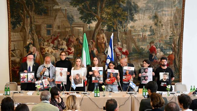 Relatives of Israeli hostages Omri Miran, Agam Berger, Guy Gilboa Dalal, Tamir Nimrodi and Bibas family members (Shiri, Yarden, Ariel, Kfir), held in Gaza speak to reporters. Picture: AFP.