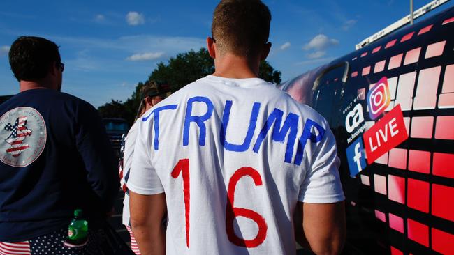 Trump supporters walk outside the debate hall at Hofstra University. Picture: AFP