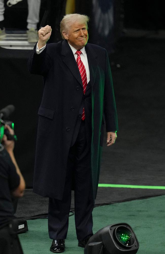 Donald Trump salutes the crowd during the 2025 NCAA Division I Men's Wrestling Championship. Picture: Getty Images via AFP