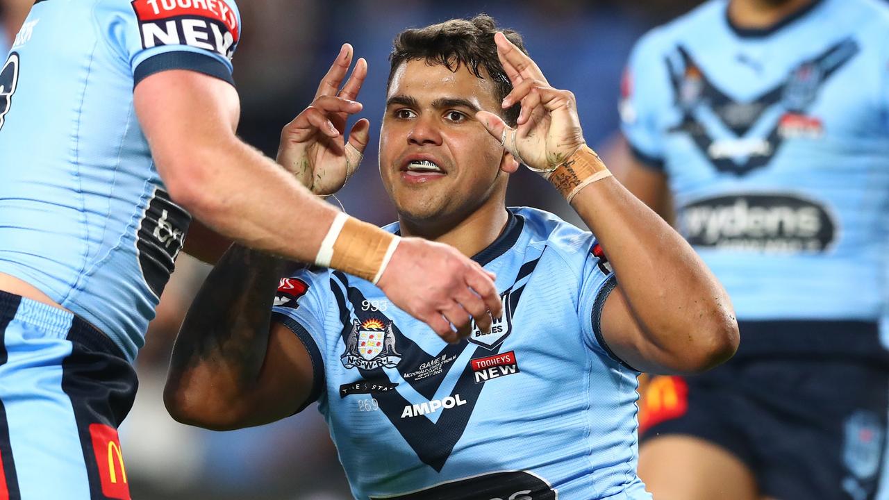 GOLD COAST, AUSTRALIA - JULY 14: Latrell Mitchell of the Blues celebrates a try during game three of the 2021 State of Origin Series between the New South Wales Blues and the Queensland Maroons at Cbus Super Stadium on July 14, 2021 in Gold Coast, Australia. (Photo by Chris Hyde/Getty Images)