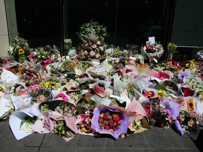 The flowers left in honor of teacher Lilie James outside St Andrews School. Picture: NCA Newswire