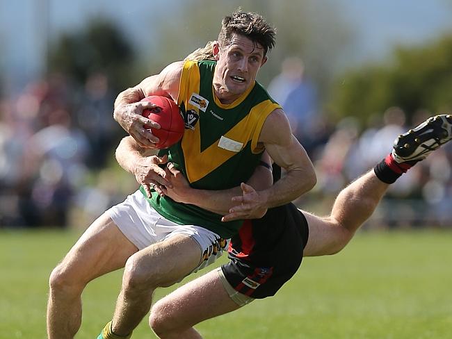 Gippsland Football League Grand Final match between Maffra Eagles and Leongatha Parrots. Maffra became the 2016 premiers, defeating Leongatha 13.10 (88) to 9. 16 (67). Jackson Scott tackles Brenton Fitzgerald. Picture: Yuri Kouzmin