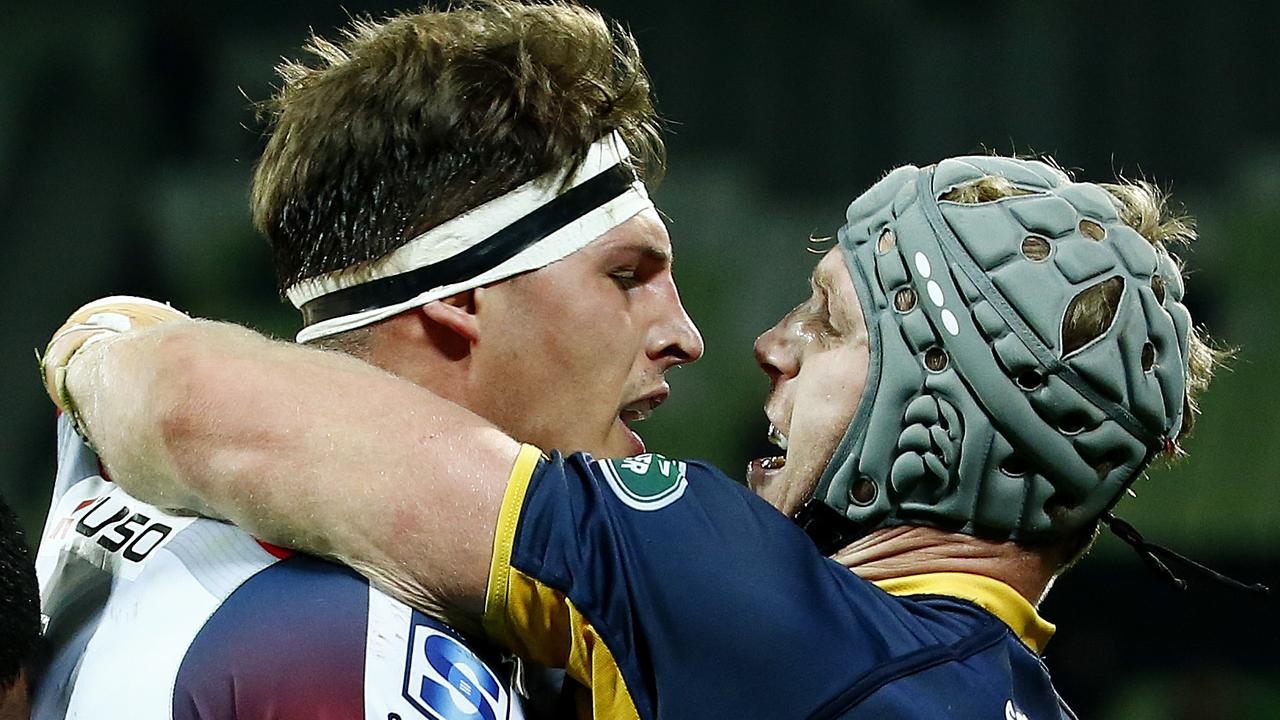 Rebels lock Luke Jones and Brumbies flanker David Pocock get into a scuffle.