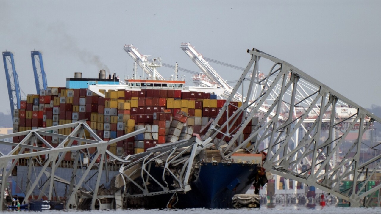 NTSB officials make their way onto cargo ship which brought down Baltimore bridge