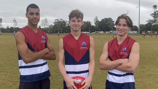 St Andrew's Anglican College senior boys players Jacob Hughes, Jaxon Woodward and Jesh Morgan get ready for a day of play in the AFLQ Secondary Schools Cup.