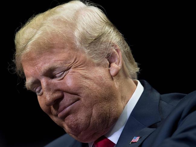 TOPSHOT - US President Donald Trump delivers remarks at a Make America Great Again rally in Fort Wayne, Indiana on November 5, 2018. (Photo by Jim WATSON / AFP)