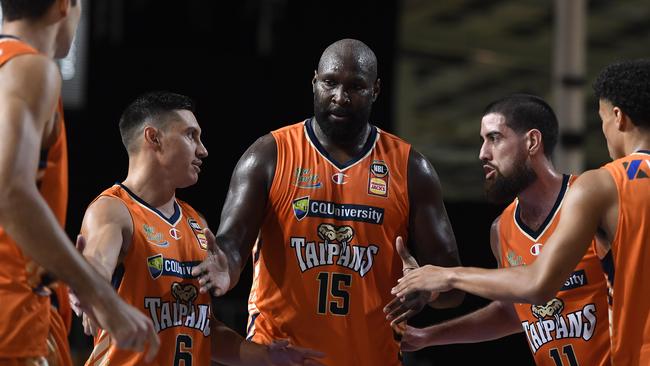 CAIRNS, AUSTRALIA – MARCH 28: Nathan Jawai of the Taipans is congratulated by teammates during the round 11 NBL match between the Cairns Taipans and the Adelaide 36ers at Cairns Pop Up Arena on March 28, 2021 in Cairns, Australia. (Photo by Albert Perez/Getty Images)