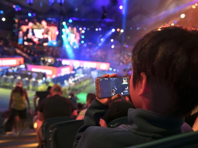 Scenes from the Fortnite Summer Smash video game competition. Kids are going to extreme measures and lashing out in order to play Fortnite. Picture: Tennis Australia.