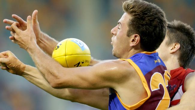 The guns of Marco Paparone in action as he takes a mark against Melbourne. Picture: Darren England.