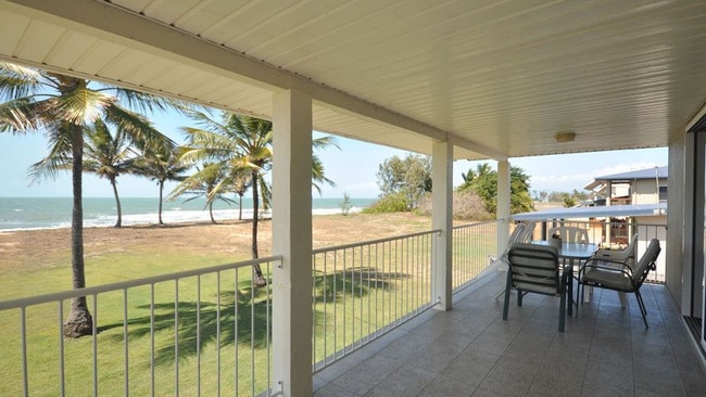 This absolute beachfront, three-bedroom house on 700 sqm at 14 Allamanda Ave, Forrest Beach, is for sale for $570,000.