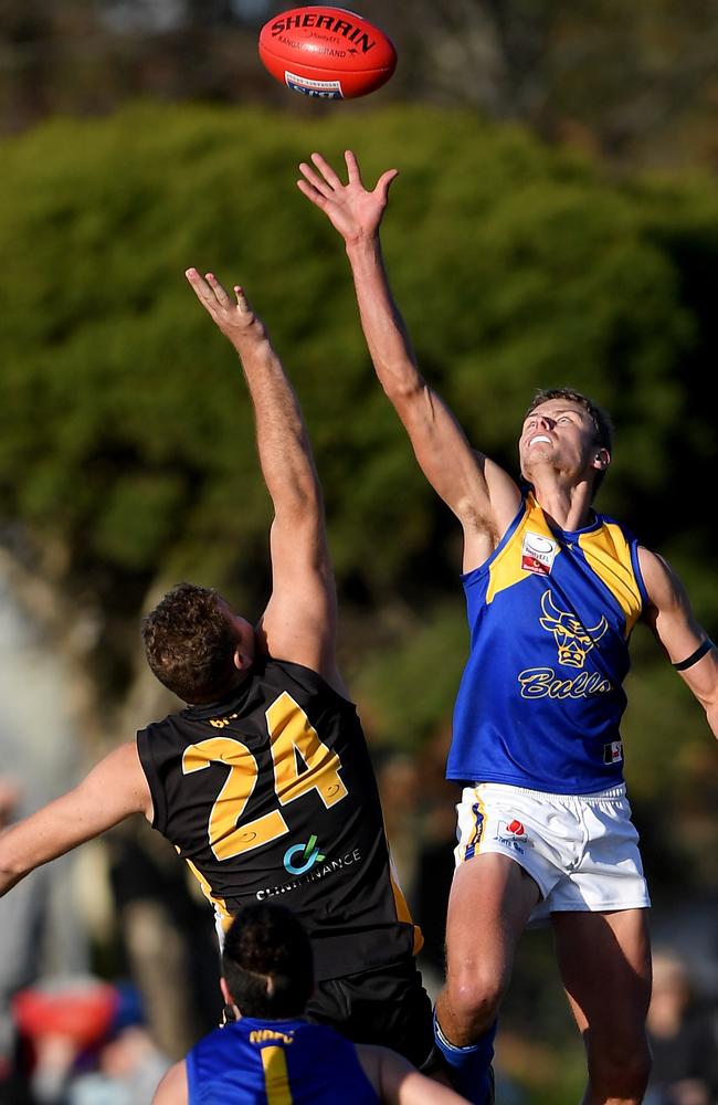 Balwyn’s Danny Baglava and Noble’s Jake Gains in a ruck contest.