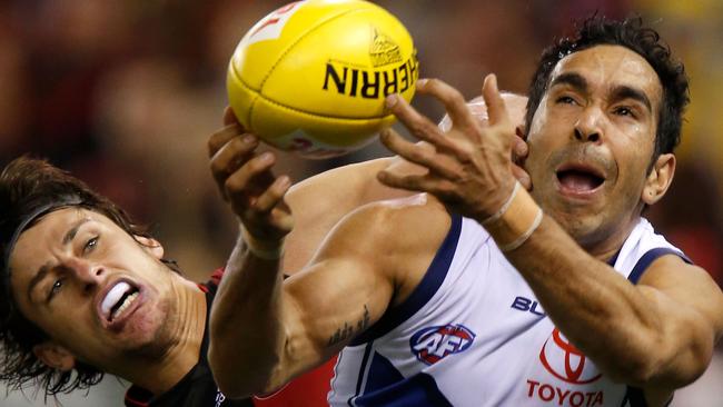 MELBOURNE, VICTORIA - AUGUST 15: Mark Baguley of the Bombers attempts to spoil Eddie Betts of the Crows the round 20 AFL match between the Essendon Bombers and the Adelaide Crows at Etihad Stadium on August 15, 2015 in Melbourne, Australia. (Photo by Darrian Traynor/AFL Media/Getty Images)