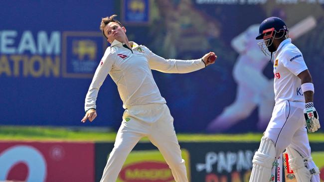 Australia's Matthew Kuhnemann bowls in Galle. (Photo by Ishara S. KODIKARA / AFP)