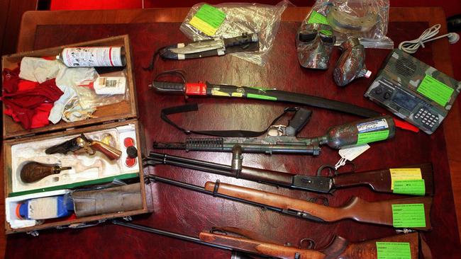 Guns, knives, police scanner, paint, ball mask etc found at Ivan Milat's home.
