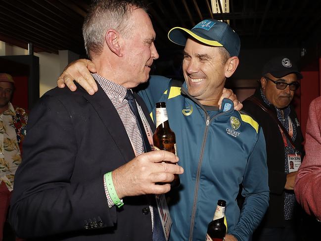 Australian coach Justin Langer (right) celebrates with chairman on selectors Trevor Hohns after Australia secured the Ashes in Manchester. Picture: Getty Images