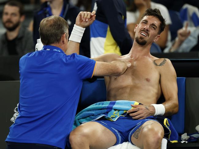 Kokkinakis battled shoulder pain throughout the bruising encounter. Picture: Daniel Pockett/Getty Images