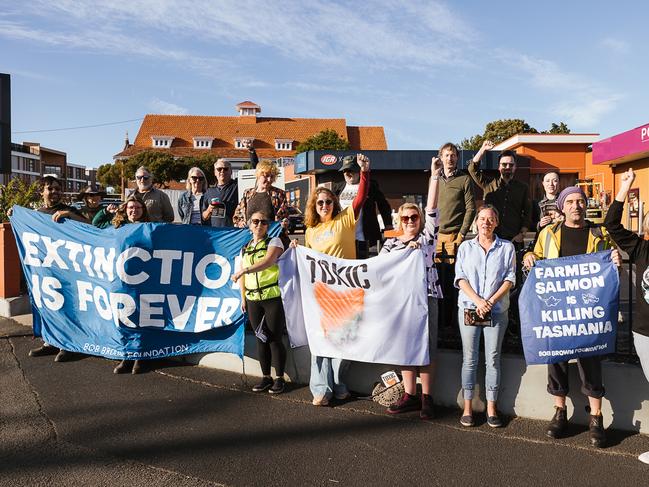 Bob Brown Foundation anti-salmon protest outside Hill Street store in New Town. Activists are urging Hill Street grocery store chain to stop selling Tasmanian salmon products. Picture: Supplied/Nina Hamilton