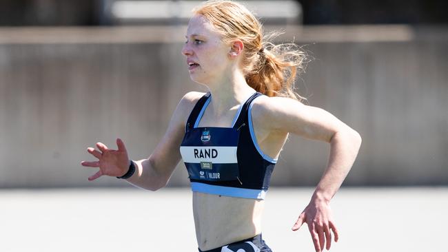 Ada Rand setting a meet record in the girls 17 years 1500m. She attends the Meridian School.