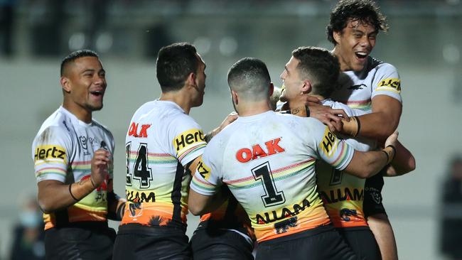 SYDNEY, AUSTRALIA - AUGUST 01: Nathan Cleary of the Panthers is congratulated by team mates after scoring a try during the round 12 NRL match between the Manly Sea Eagles and the Penrith Panthers at Lottoland on August 01, 2020 in Sydney, Australia. (Photo by Jason McCawley/Getty Images)