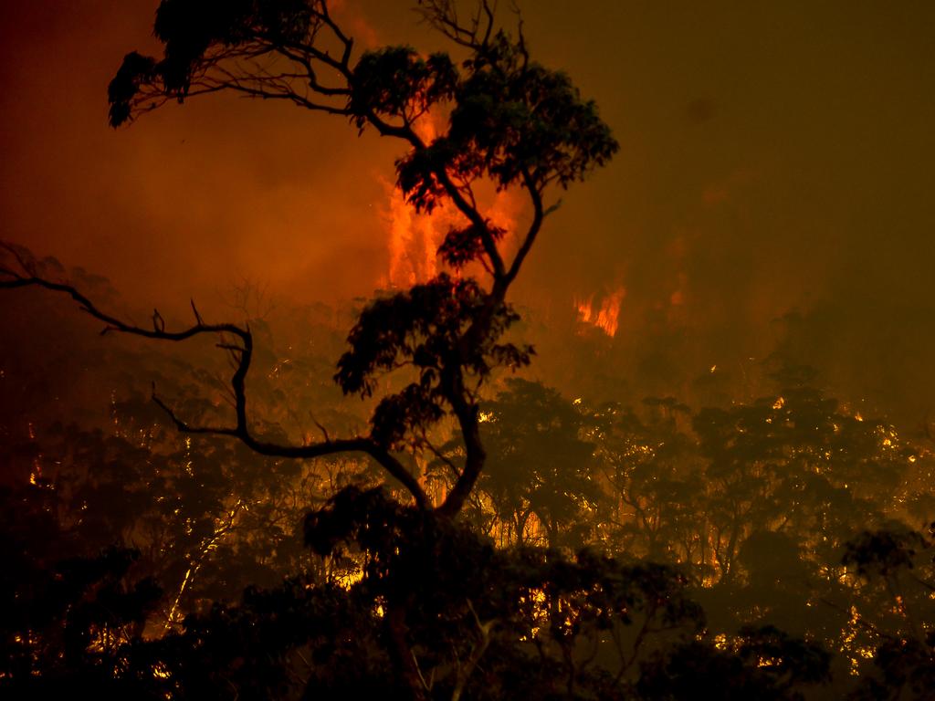 The Gospers Mountain fire continues to be listed at Emergency Warning Level. Reports of houses being destroyed are coming in. The fire is moving towards Kurrajong from Bilpin. From 1767 Bells Line of Road. The fire rapidly approached the house with a roar. Ripping up the valley the intense heat hit well before the flame. Embers were the first to arrive. The house was saved by efforts of Killara RFS and the property owner, Mark Jol. The owner and his son Andrew remained to defend the property. The house was well prepared in advance of the fire front. Picture: Matrix