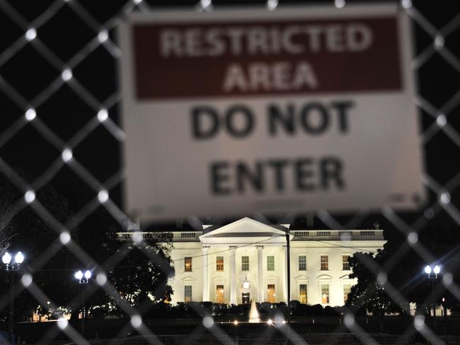 The White House in Washington,DC is seen during the US presidential election night on November 8, 2016. Millions of Americans turned out Tuesday to decide whether to send Hillary Clinton to the White House as their first woman president or to put their trust in maverick populist Donald Trump. Picture: AFP PHOTO / YURI GRIPAS
