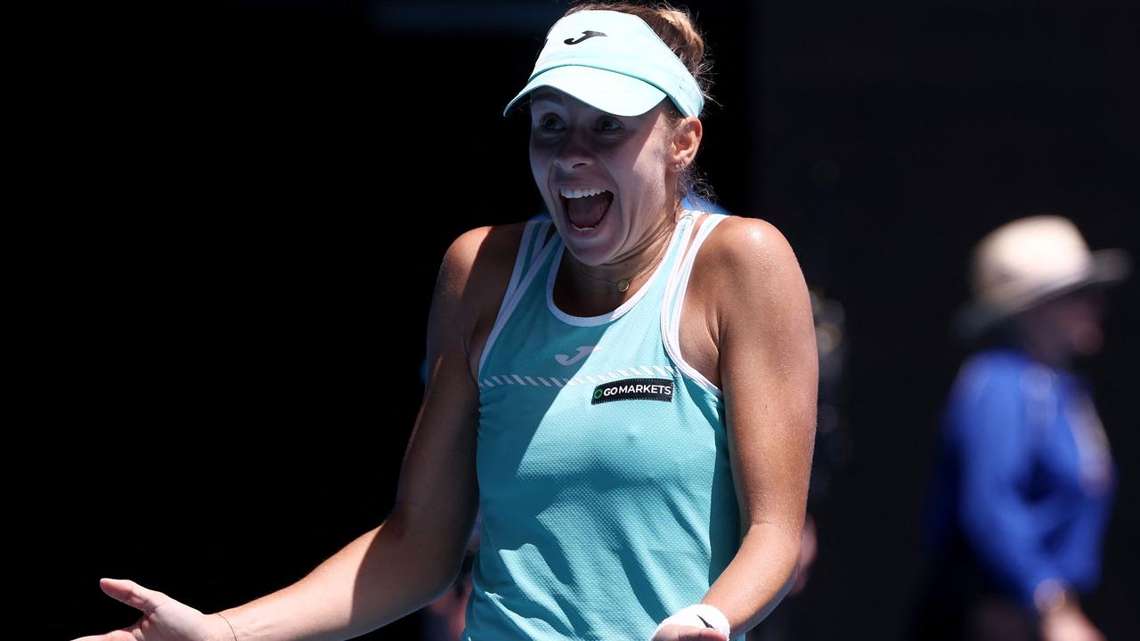 Magda Linette celebrates victory against Karolina Pliskova. (Photo by DAVID GRAY / AFP)