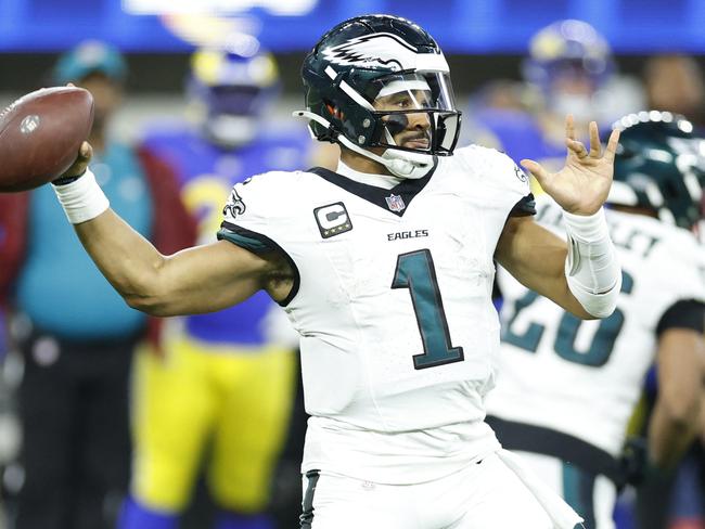 INGLEWOOD, CALIFORNIA - NOVEMBER 24: Jalen Hurts #1 of the Philadelphia Eagles throws a pass during the third quarter against the Los Angeles Rams at SoFi Stadium on November 24, 2024 in Inglewood, California.   Ronald Martinez/Getty Images/AFP (Photo by RONALD MARTINEZ / GETTY IMAGES NORTH AMERICA / Getty Images via AFP)