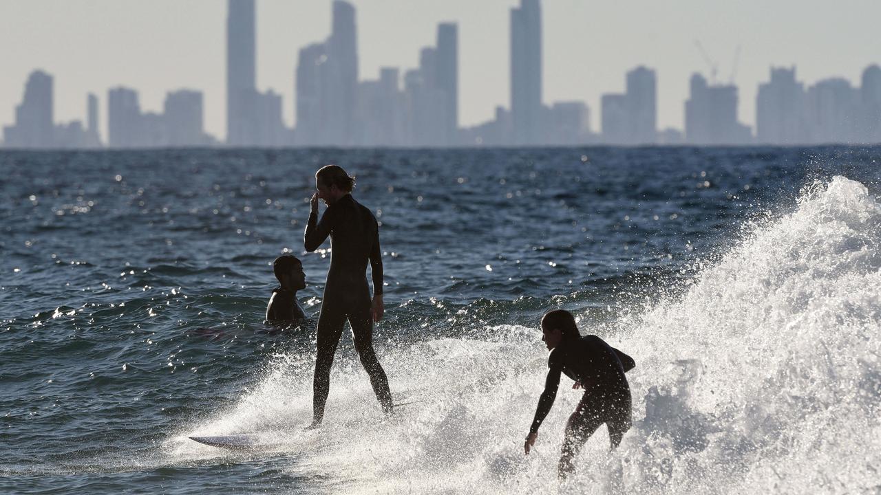 Surfers at Snapper Rocks on the Gold Coast. Picture: NCA NewsWire / Steve Holland