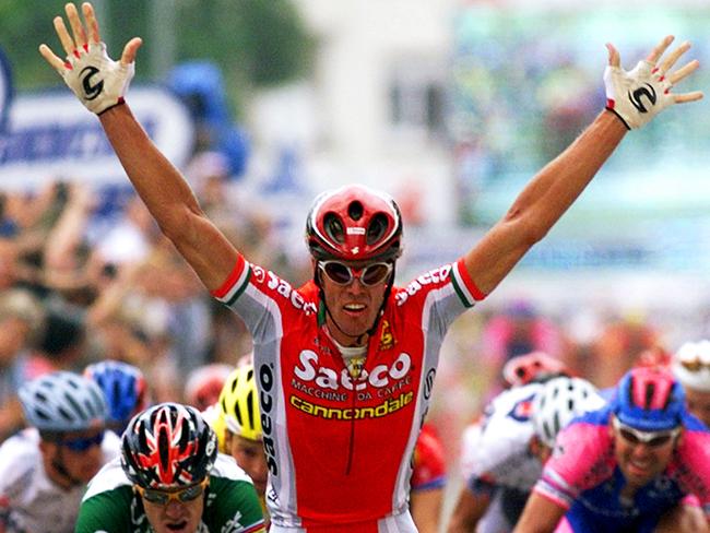 Cycling - Italian cyclist Mario Cipollini crossing line to win seventh stage of Tour de France race. He became the first cyclist to win four successive Tour de France stages.