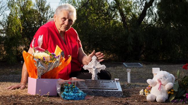 Maria Russo at the grave of her stillborn son, Bernardino Russo-Rossi, at Adelaide’s West Terrace Cemetery. Picture: Matt Turner