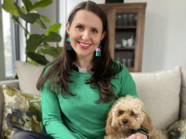 Breast cancer survivor Dimity Paul with her cavoodle, Bismarck.