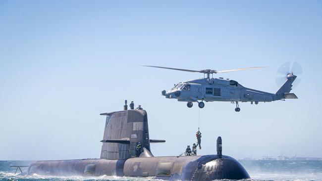 HMAS Rankin conducts helicopter transfers in Cockburn Sound, Western Australia, as part of Rankin's training assessments to ensure the boat is ready to deploy.