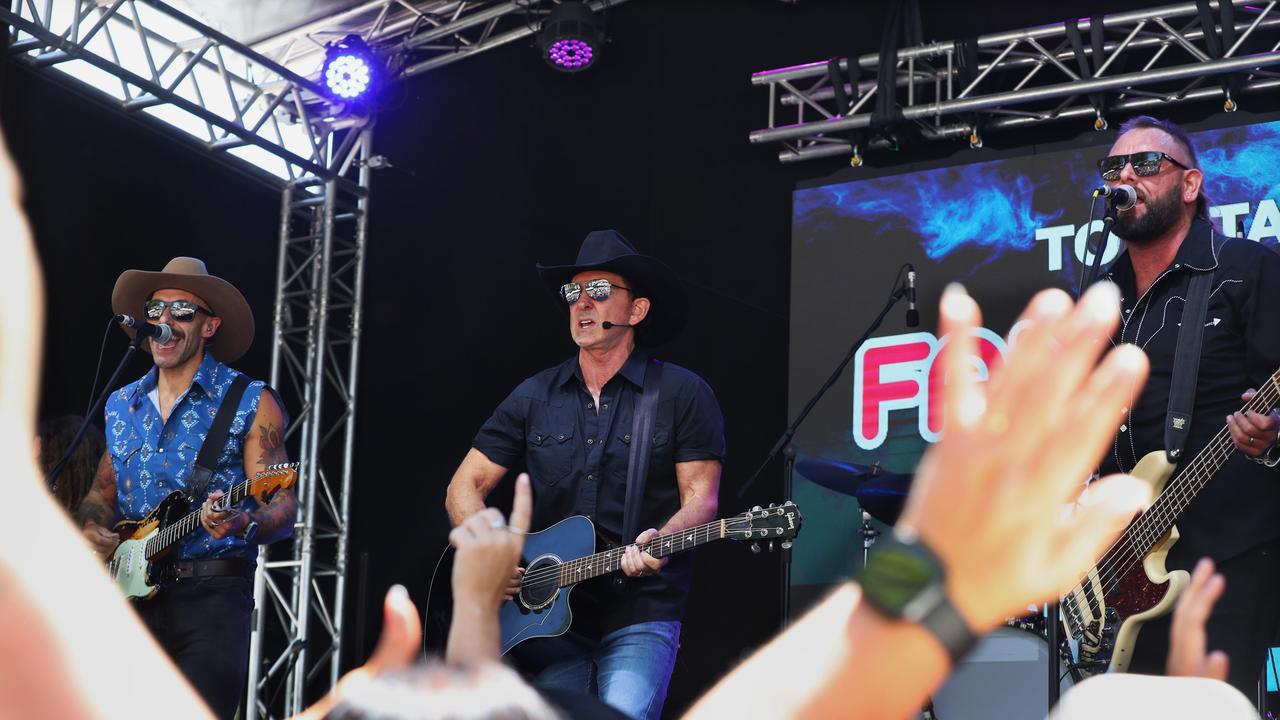 TAMWORTH, AUSTRALIA - JANUARY 24: The Wolfe Brothers, Nick and Tom Wolfe, perform with Lee Kernaghan on the Toyota Fan Zone stage during the Tamworth Country Music Festival (TCMF) on January 24, 2025 in Tamworth, Australia. The Tamworth Country Music Festival features several days of music and celebration culminating on Australia Day, with vibrant live performances from numerous artists across many venues, showcasing the rich culture of Australian country music. Attendees can enjoy a lineup of talented musicians and participate in festivities that highlight the festival's significance as one of the largest country music events in the world. (Photo by Lisa Maree Williams/Getty Images)