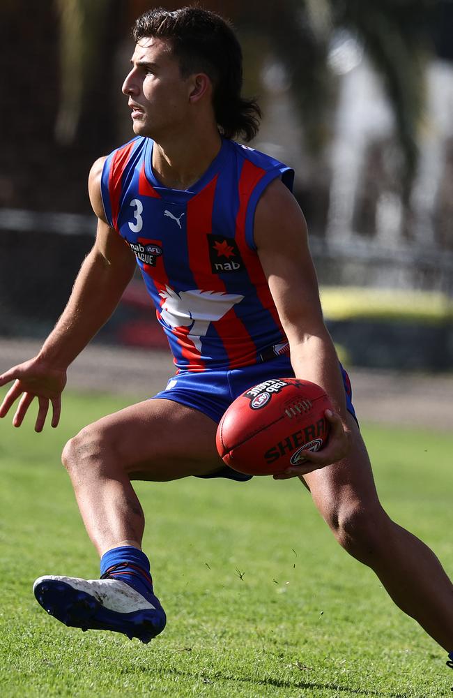 Daicos shows his evasive skills as he runs downfield. Picture: Michael Klein