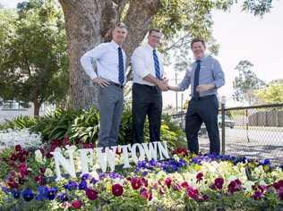 Admiring the floral display at Newtown State School are (from left) Shadow Minister for Education and Training Tim Mander MP, Member for Toowoomba North Trevor Watts MP and Newtown State School Principal Ben Kidd. . Picture: Photo Contributed