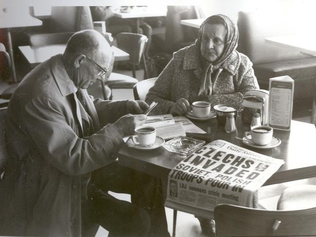 Josef Chromy’s parents Frantisek and Libuse at Sydney Airport on August 20 1968, reading the news of the Soviet invasion of their homeland the very same day as they are about to fly back there.