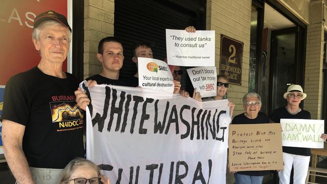 Give a Dam protesters including Phil Bradley (far left) get ready to protest outside the Smec office at Parramatta in 2019.