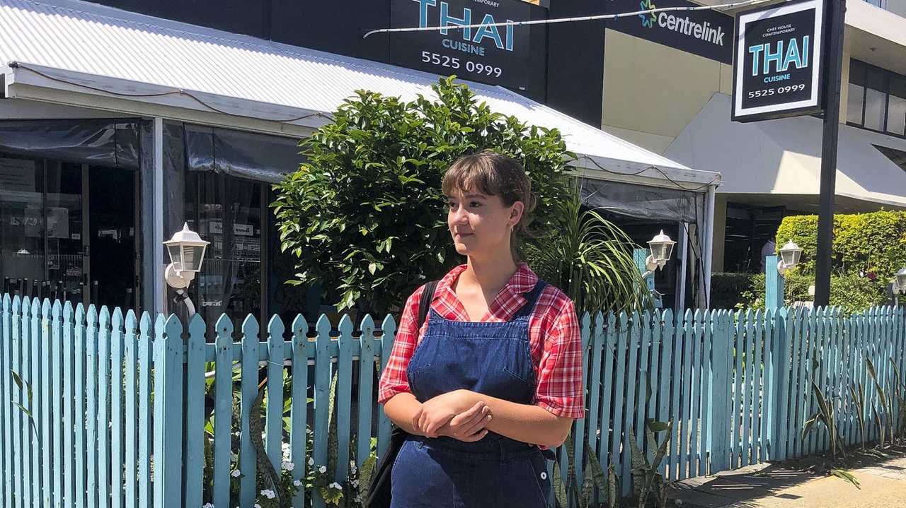 Tugun local Vivi Baker, 18, was one of the many hospitality staff laid off as a consequence of the government's coronavirus restrictions on restaurants. She is pictured here outside Currumbin Centrelink Photo: Jessica Lamb. Picture: Jessica Lamb