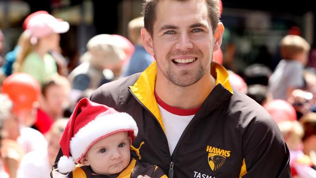 Luke Hodge with baby Cooper back in 2008.