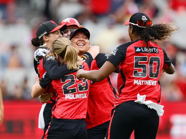 MELBOURNE, AUSTRALIA - DECEMBER 01: The Renegades celebrate victory during the WBBL Final match between Melbourne Renegades and Brisbane Heat at Melbourne Cricket Ground on December 01, 2024, in Melbourne, Australia. (Photo by Quinn Rooney/Getty Images)