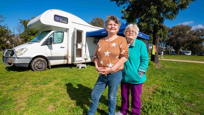 Wendy Squires and Denise Garbutt at a pop-up camp of displaced Victorians. Picture: Simon Dallinger