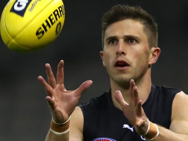 MELBOURNE, AUSTRALIA - JULY 02: Marc Murphy of the Blues takes the ball during the round 5 AFL match between the Carlton Blues and the St Kilda Saints at Marvel Stadium on July 02, 2020 in Melbourne, Australia. (Photo by Robert Cianflone/Getty Images)