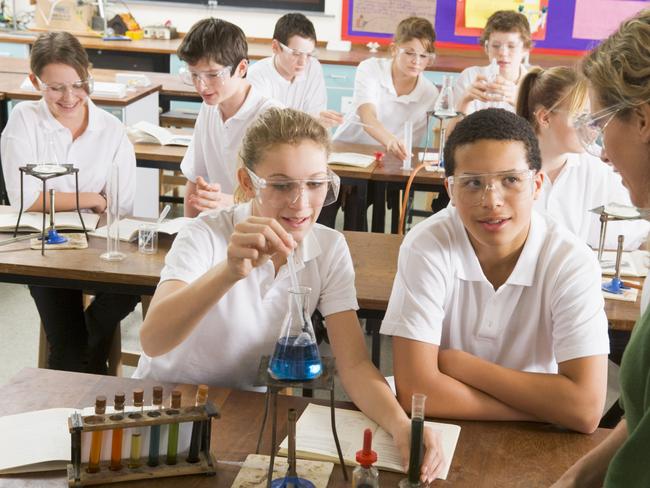 QST Enrolments generic school children conducting science experiment