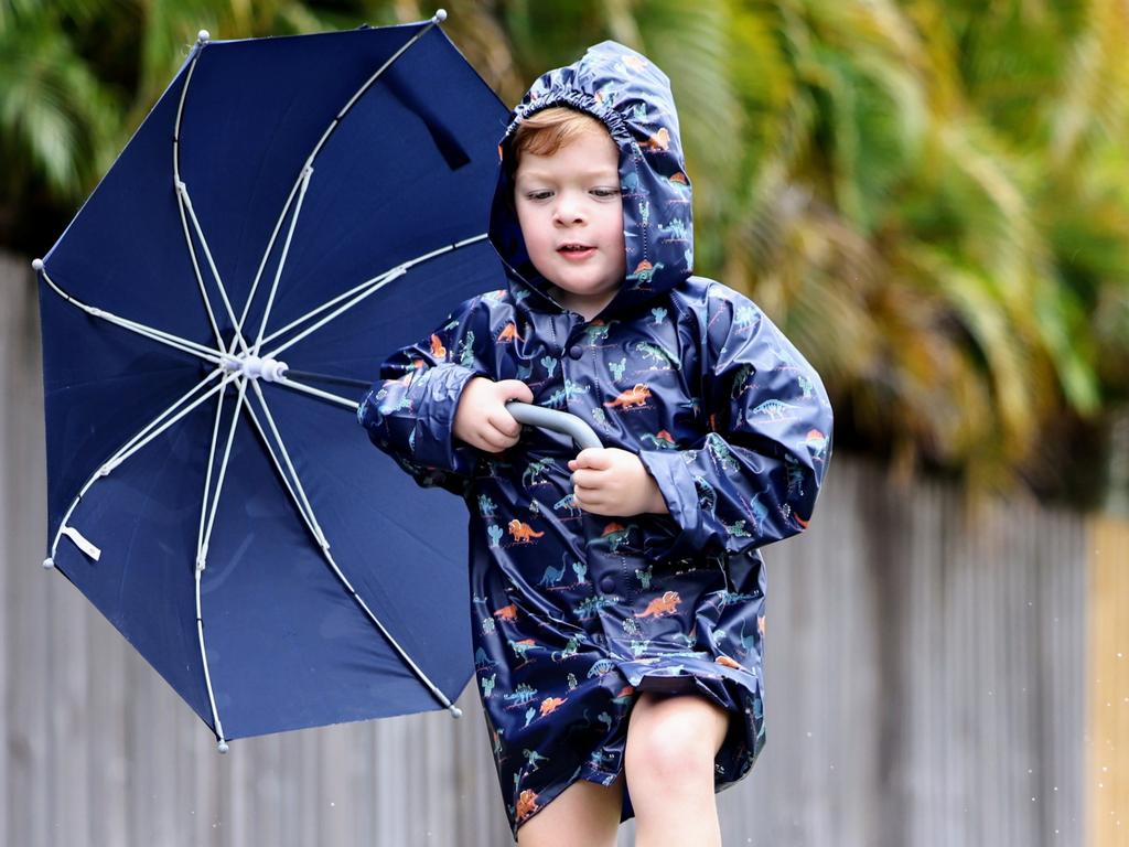 The start of summer has seen rainy weather return to Far North Queensland. Cairns youngster Noah Millard, 4, enjoys the return of the wet weather. File photo. Picture: Brendan Radke