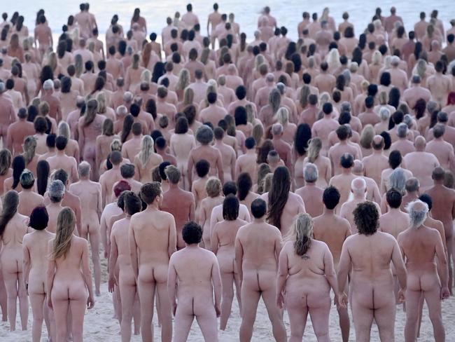 SYDNEY, AUSTRALIA - NewsWire Photos NOVEMBER 26, 2022: Sydney-siders strip bare naked at Bondi Beach this morning for a Spencer Tunick photograph to raise awareness on the importance of early detection for skin cancer.Picture: NCA NewsWire / Jeremy Piper