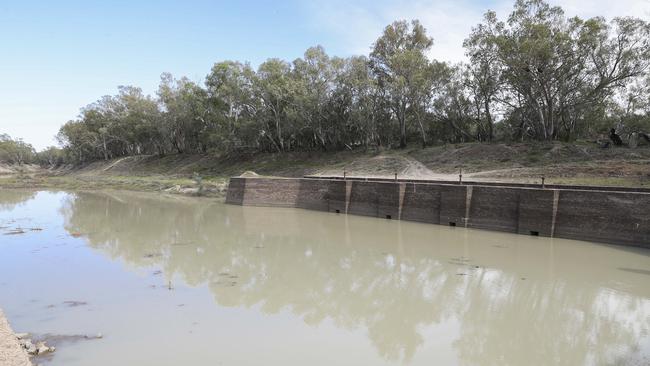 The weir on the Darling river at Bourke, photographed in 2019. Pumping from the Barwon River is prohibited when daily flows through the Bourke weir are below 4894ML/day. Picture: Dylan Robinson