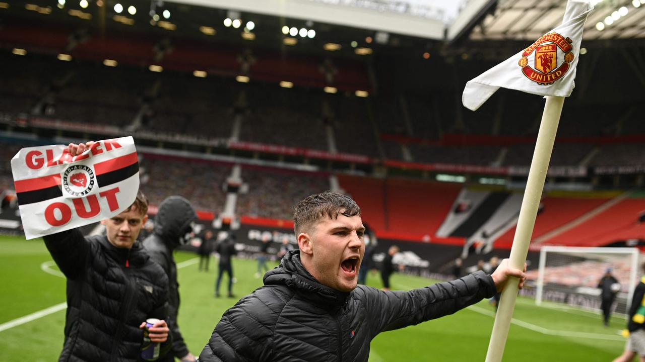 Supporters protest against Manchester United’s owners. (Photo by Oli SCARFF / AFP)